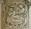 Panel 15:05 - The Nativity of Cain (Eve breast-feeding while Adam prepares food)